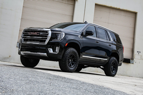 ICON 21-24 GM Tahoe/Suburban/Yukon/Yukon XL 2.5-3.25in Stage 4 Suspension System - K73104T Photo - lifestyle view