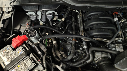 J&L 21-26 Ford F-150 5.0L Oil Separator 3.0 PCV Side - Clear Anodized - 3131P-C Photo - Mounted