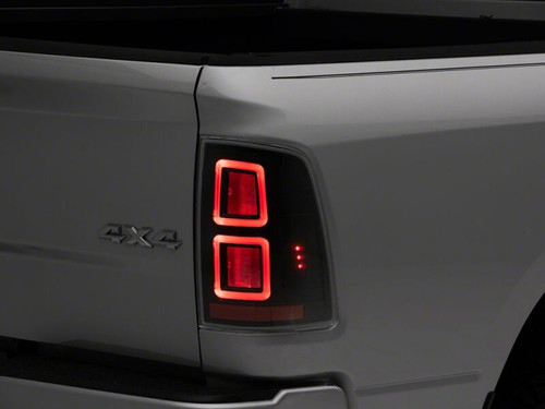 Raxiom 09-18 Dodge RAM 1500 LED Tail Lights- Black Housing- Clear Lens - R110153 Photo - Close Up