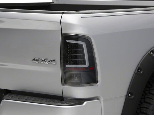 Raxiom 09-18 Dodge RAM 1500 Axial Series LED Tail Lights- Black Housing- Clear Lens - R113541 Photo - Primary