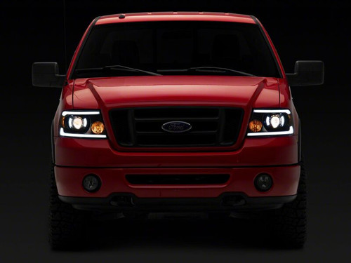 Raxiom 04-08 Ford F-150 Axial Series Projector Headlights with LED Bar- Black Housing- Clear Lens - T566363 Photo - Close Up