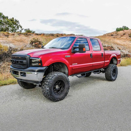 Westin 1999-2016 Ford F-250/F-350/F-450/F-550 Crew Cab Outlaw Drop Nerf Step Bars Textured Black - 20-11335 Photo - Mounted