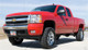 Tuff Country 14-18 Chevy Silverado 1500 4wd 4in Lift Kit (w/1 Pc OE Cast Stl Up Arms SX8000) - 14059KN Photo - Mounted