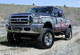 Tuff Country 05-07 Ford F-250 Super Duty 4x4 5in Lift Kit (SX8000 Shocks) - 24973KN Photo - Mounted