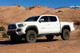 Tuff Country 05-23 Toyota Tacoma 4X4 & Prerunner 3in Lift Kit w/Control Arms (Excl TRD Pro SX8000) - 53905KN Photo - Mounted