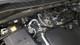 J&L 19-24 Chevy Silverado/GMC Sierra 1500 2.7L Passenger Side Oil Separator 3.0 - Black Anodized - 3093P-B Photo - Mounted