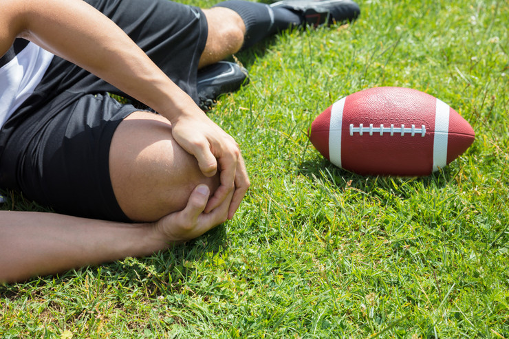 Common Injuries for Football and How Players Can Help Reduce Risk
