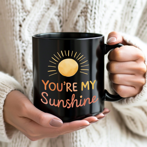 A sweet and simple 11oz black mug that brightens any day. Perfect for sharing warm moments, thoughtful gifts, or reminding someone they’re your sunshine.