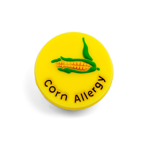 Bright yellow round charm with corn graphic reading Corn Allergy