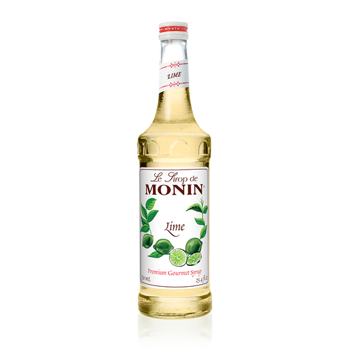 A 750 mL (25.4 fl oz) bottle of Monin Lime Premium Gourmet Syrup. The pale, straw-colored syrup is visible through the bottle, which features a white label with the Monin logo and botanical illustrations of whole and sliced limes with green leaves. The label includes the text "Lime" and "Premium Gourmet Syrup."
