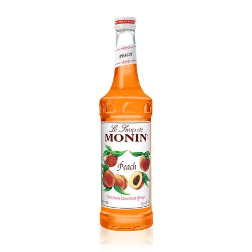 A 750 mL (25.4 fl oz) bottle of Monin Peach Premium Gourmet Syrup. The bright orange syrup is visible through the bottle, which features a white label with the Monin logo and botanical illustrations of whole and sliced peaches with green leaves. The label includes the text "Peach" and "Premium Gourmet Syrup."