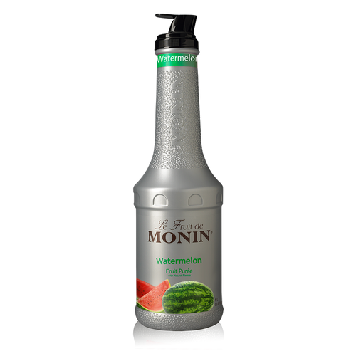 A 1-liter (33.8 fl oz) silver bottle of Le Fruit de Monin Watermelon Fruit Purée. The bottle features a textured neck with the Monin logo embossed and a black integrated pour spout. The label displays the Monin brand name, the text "Watermelon Fruit Purée with Natural Flavors," and a realistic illustration of a whole green watermelon alongside two red sliced wedges. A green "Watermelon" label is also visible around the neck.