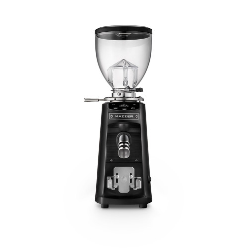 A straight-on front view of a black Mazzer espresso grinder. The unit includes a large clear bean hopper, a digital touch-control interface, a silver coffee grounds delivery chute, and an adjustable portafilter holder at the base.