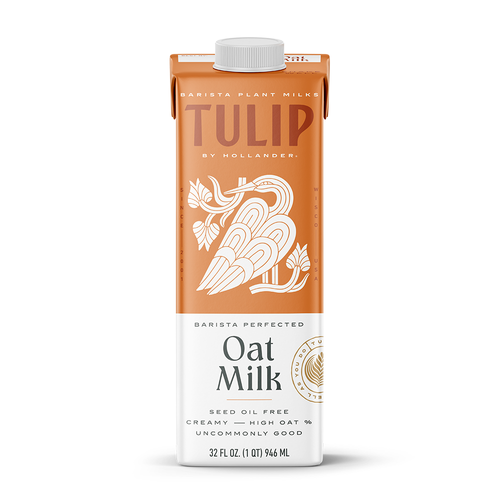A 32 fl oz (1 QT) 946 mL carton of Tulip by Hollander Barista Plant Milks in Oat Milk flavor. The carton features an orange-brown and white label with a stylized illustration of a crane or heron bird amidst leaves in the center. The lower half displays the text "Barista Perfected," "Oat Milk," "Seed Oil Free," "Creamy — High Oat %," and "Uncommonly Good."