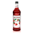 A 1-liter (33.8 fl oz) bottle of Monin Strawberry Premium Gourmet Syrup. The bright red syrup is visible through the bottle, which features a white label with the Monin logo and botanical illustrations of ripe strawberries on the vine with green leaves. The label includes the text "Strawberry" and "Premium Gourmet Syrup."