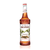 A 750 mL (25.4 fl oz) bottle of Monin Cinnamon Premium Gourmet Syrup. The amber-colored syrup is visible through the bottle, which features a white label with the Monin logo and botanical illustrations of cinnamon sticks and green leaves. The label includes the text "Cinnamon" and "Premium Gourmet Syrup."