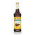 A 750 mL (25.4 fl oz) bottle of Monin Sugar Free Chocolate Gourmet Syrup. The dark brown syrup is visible through the bottle, which features a yellow label with the Monin logo and a blue "Sugar Free" banner. The label includes an illustration of dark chocolate bars and truffles, along with the text "Sugar Free, Calorie Free Gourmet Syrup."
