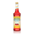 A 750 mL (25.4 fl oz) bottle of Monin Sugar Free Raspberry Gourmet Syrup. The vibrant red syrup is visible through the bottle, which features a yellow label with the Monin logo and a blue "Sugar Free" banner. The label includes an illustration of three ripe raspberries with white blossoms, along with the text "Sugar Free, Calorie Free Gourmet Syrup."