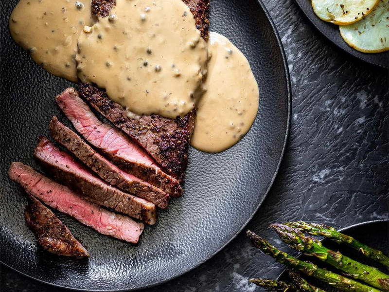 Green peppercorn and brandy Chef created finishing sauce