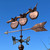 Three apples on a branch weathervane