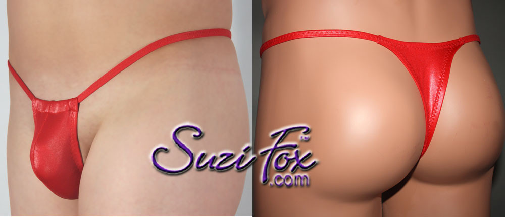 Men's Adjustable Pouch, T-back thong, shown in Red Wet Look Lycra Spandex, custom made by Suzi Fox.
• Available in any fabric on this site.
• Standard front height is 5 inches (12.7 cm) tall.
• Available in 3, 4, 5, 6, 7, 8, 9, and 10 inch front heights.
• Choose your pouch size!
Made in the U.S.A.