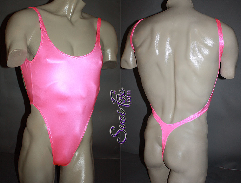 Mens One Piece T-back Thong Swim Suit shown in Neon Pink Milliskin Tricot  Spandex, custom made by Suzi Fox.