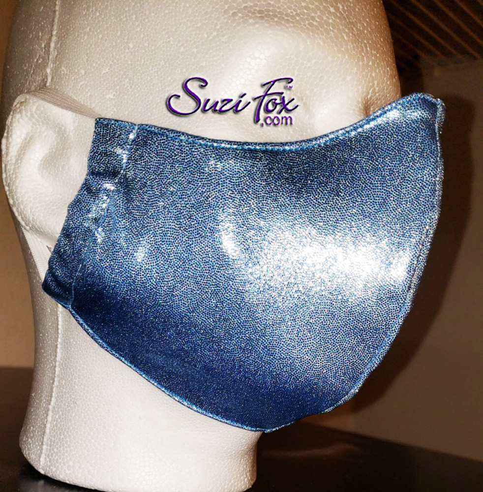 Baby Blue Metallic Mystique mask Personal protection mask (PPE). NOT MEDICAL GRADE! 
Matches blue Romy and Michele dress.
These are Duckbill style, with ear loop elastic. Nose wire included for adjustments.
Lining is 100% cotton. There is NO FILTER, but there is a pocket where you can put one. They are washable.
