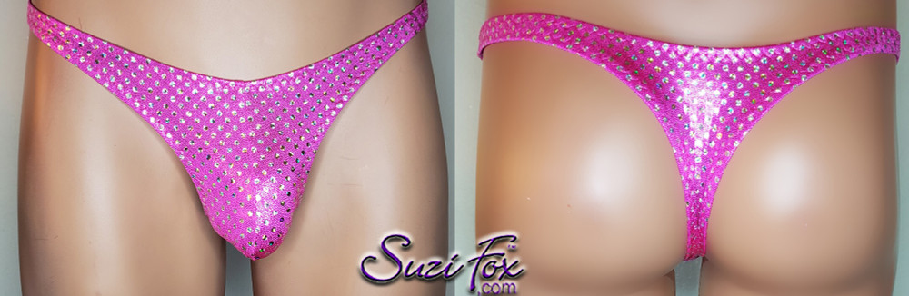 Mens Pouch Front, Wide Strap, T-Back thong - shown in Hot Pink Metallic Mystique with small silver iridescent dots, custom made by Suzi Fox.
THIS IS ONE OF A KIND! Brand new! Ready to ship!
• Size Medium, Waist 32-35 inches (81.28 cm - 88.9 cm)
• Standard front height is 6 inches (15.24 cm).
• Standard pouch size is 2 inches (5.08 cm).
• Made in the U.S.A.