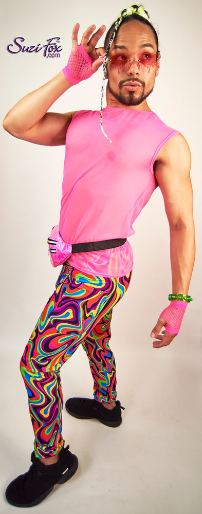 Mens Muscle T-Shirt for Raves, EDC, Burning Man Festivals shown in see through neon pink mesh custom made by Suzi Fox.
Shown with 20979 abstract swirls spandex jogger pants by Suzi Fox.