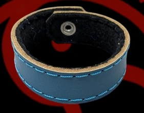 Turquoise 100% Leather wrist band.
They are fleece lined to be super comfortable and can be worn anywhere.