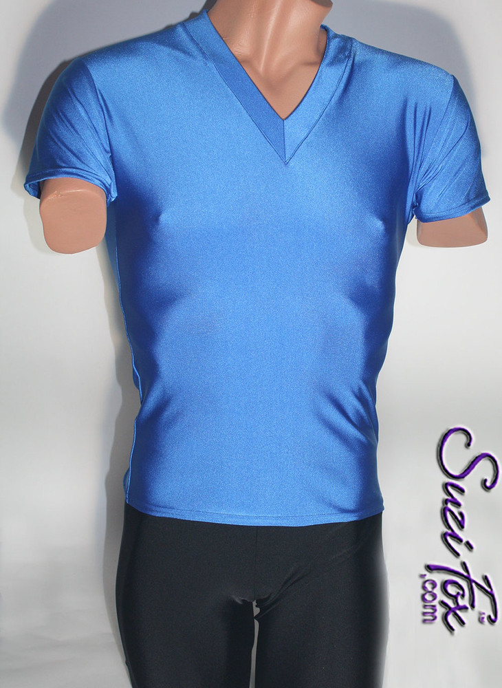 Mens V Neck Tee Shirt shown in Royal Blue Milliskin Tricot Spandex, custom made by Suzi Fox.
• Available in black, white, red, royal blue, sky blue, turquoise, purple, green, neon green, hunter green, neon pink, neon orange, athletic gold, lemon yellow, steel gray Miilliskin Tricot spandex, and any fabric on this site.
• Choose your sleeve length.
• Give us your measurements for a custom fit!
• Standard length is 24 inches (61 cm) for sizes XXXS-Medium; 27 inches (68.6 cm) for sizes Large and up.
• Optional add extra length to the shirt.
• Made in the U.S.A.