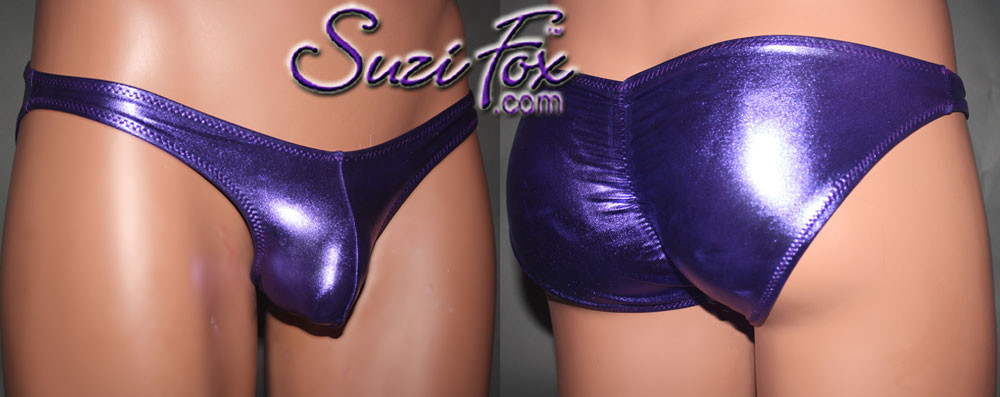 Mens Pouch Front, Wide Strap, Gathered Full coverage Rear Bikini - shown in Purple Metallic Foil Spandex, custom made by Suzi Fox.
• Gathered rear accentuates the butt!
• Available in gold, silver, copper, gunmetal, turquoise, Royal blue, red, green, purple, fuchsia, black faux leather/rubber Metallic Foil or any fabric on this site.
• Standard front height is 6 inches (15.2cm).
• Available in 4, 5, 6, 7, 8, 9, and 10 inch front heights.
• Wear it as swimwear OR underwear!
• Made in the U.S.A.