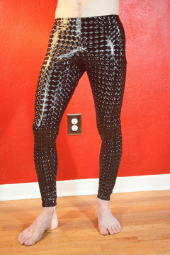 Mens Hiphugger Leggings shown in Black 3D Prism Vinyl/PVC Spandex, custom made by Suzi Fox.
Custom made to your measurements!
• Available in black 3D Prism, red 3D Prism,  Vinyl; gloss black, white, red, navy blue, royal blue, turquoise, purple, Neon Pink, fuchsia, light pink; matte black (no shine), matte white (no shine), and any fabric on this site.
• 1 inch no-roll elastic at the waist.
• Optional 1 or 2-slider crotch zipper.
• Choose your ankle size - tight ankles, jean cut, boot cut, or bellbottom.
• Optional ankle zippers.
• Optional belt loops.
• Optional rear patch pockets.
Crafted in the U.S.A.