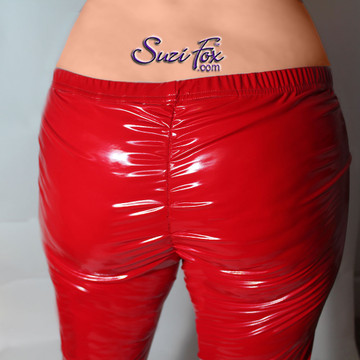 Scrunch butt (gathered rear) Leggings shown in Red Gloss vinyl/PVC, custom made by Suzi Fox.
• Choose any fabric on this site, including vinyl/PVC, metallic foil, metallic mystique, wetlook lycra Spandex, Milliskin Tricot Spandex. The vinyl/PVC is a latex alternative, great for people allergic to latex!
• Optional custom sizing.
• Plus size available.
• 1 inch elastic at the waist.
• Optional rear patch pockets.
• Optional belt loops.
• Optional ankle zippers.
• Worldwide shipping.
• Made in the U.S.A