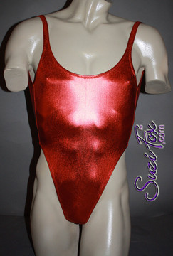 Mens One Piece T-back Thong Bodysuit or Leotard shown in Red Metallic foil Spandex, custom made by Suzi Fox.
• Custom made to your measurements.
• High leg hole, low back and t-back thong rear.
• Available in any fabric on this site.
• Made in the U.S.A.