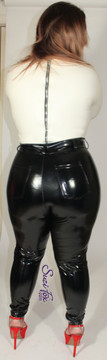 Custom Jean style Leggings shown in Black Gloss Vinyl/PVC coated Nylon Spandex, by Suzi Fox.
• Waistband with button.
• Fly front with zipper.
• Choose any fabric on this site, including vinyl/PVC, metallic foil, metallic mystique, wetlook lycra Spandex, Milliskin Tricot Spandex. The vinyl/PVC is a latex alternative, great for people allergic to latex!
• Optional custom sizing.
• Plus size available.
• Optional rear patch pockets.
• Optional belt loops.
• Optional ankle zippers.
• Worldwide shipping.
• Made in the U.S.A.