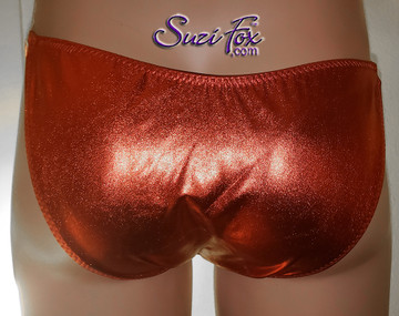 Mens Smooth Front, Skinny Strap, Brazilian (3/4 rear coverage) Bikini - shown in Red Metallic Foil Spandex, custom made by Suzi Fox.
• Available in gold, silver, copper, gunmetal, turquoise, Royal blue, red, green, purple, fuchsia, black faux leather/rubber Metallic Foil or any fabric on this site.
• Standard front height is 8 inches (20.3 cm).
• Available in 4, 5, 6, 7, 8, 9, and 10 inch front heights.
• Wear it as swimwear OR underwear!
• Made in the U.S.A.