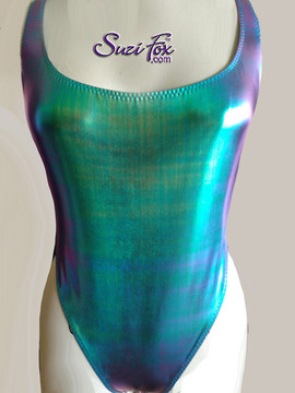 Womens One Piece T-back Thong Swim Suit shown in Blue-Green Metallic Foil, custom made by Suzi Fox.
• Custom made to your measurements.
• The high leg hole, low back and t-back thong rear create a stunning and sexy suit.
• Rear choices! T-back, full, full scrunch, Brazilian, Brazilian scrunch, Rio, Rio Scrunch.
• Plus size available!
• Available in any fabric on this site.
• Made in the U.S.A.