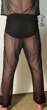 Mens Jogger pants For Raves, EDC, and Burning Man Festivals shown in see through black mesh with rainbow stripe down each pant leg, custom made by Suzi Fox.
Shown with black milliskin spandex M36 briefs.