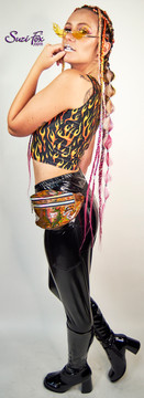Womens Jogger pants For Raves, EDC, and Burning Man Festivals shown in black stretch vinyl/pvc coated spandex custom made by Suzi Fox. 
Shown with Open Shoulder shirt in Flames Mirror Metallic Custom made by Suzi Fox.