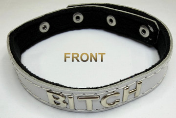 Bitch collar, 100% fleece lined leather, adjustable.
Choose your own words!
Available in the following colors:
• Black
• Red
• White
• Dark Gray
• Green
• Orange
• Purple
• Turquoise
• Yellow