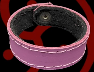 Pink 100% Leather wrist band.
They are fleece lined to be super comfortable and can be worn anywhere.