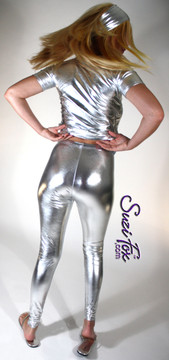 Womens Leggings shown in Silver Metallic Foil Spandex, custom made by Suzi Fox.
Waist high rise shown. You can order this in almost any fabric on this site. 
• Custom made to your measurements!
• Available in gold, silver, copper, royal blue, purple, turquoise, red, green, fuchsia, gun metal, black faux leather/rubber coated spandex. This is a 4-way stretch fabric with a brilliant shine.
• 1 inch elastic at the waist.
• Optional 1 or 2-slider crotch zipper.
• Optional ankle zippers
• Optional rear patch pockets
• Optional belt loops
• Made in the U.S.A.