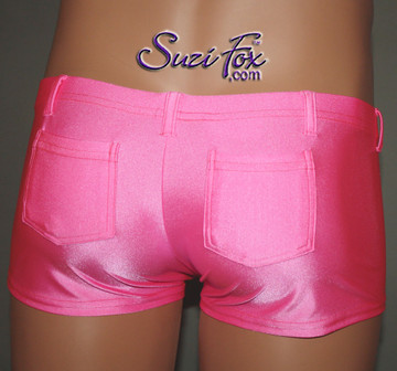Mens Super low rise, Smooth Front shorts shown in Neon Pink Milliskin Tricot Spandex, custom made by Suzi Fox.
Custom made to your measurements! Shown with optional pockets and belt loops.
• Available in black, white, red, royal blue, sky blue, turquoise, purple, green, neon green, hunter green, neon pink, neon orange, athletic gold, lemon yellow, steel gray Miilliskin Tricot spandex and any fabric on this site.
• 1 inch no-roll elastic at the waist.
• Optional belt loops.
• Optional rear patch pockets.
• Your choice of inseam and rise. 2 inch inseam is standard.
• Made in the U.S.A.