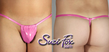 Men's Adjustable Pouch G-String thong - shown in Gloss Neon Pink Vinyl/PVC Spandex, custom made by Suzi Fox.
• Available in black, white, red, navy blue, royal blue, turquoise, purple, Neon Pink, fuchsia, light pink, matte black (no shine), matte white (no shine), black 3D Prism, red 3D Prism, Turquoise 3D Prism, Baby Blue 3D Prism, Hot Pink 3D Prism Vinyl/PVC or any fabric on this site.
• Standard front height is 5 inches (12.7 cm) tall.
• Available in 4, 5, 6, 7, 8, 9, and 10 inch front heights.
• Choose your pouch size!
• Wear it as swimwear OR underwear!
Made in the U.S.A.