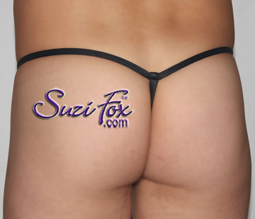 Men's Adjustable Pouch G-String thong - shown in Matte Black (no shine) Vinyl/PVC Spandex, custom made by Suzi Fox.
• Available in matte black (no shine), matte white (no shine), gloss black, white, red, navy blue, royal blue, turquoise, purple, Neon Pink, fuchsia, light pink, black 3D Prism, red 3D Prism, Turquoise 3D Prism, Baby Blue 3D Prism, Hot Pink 3D Prism Vinyl/PVC or any fabric on this site.
• Standard front height is 5 inches (12.7 cm) tall.
• Available in 4, 5, 6, 7, 8, 9, and 10 inch front heights.
• Choose your pouch size!
Made in the U.S.A.