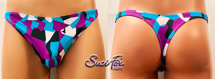 Mens Smooth Front, Wide Strap, T-back Thong- shown in LIMITED EDITION purple, turquoise, black and white spandex, custom made by Suzi Fox