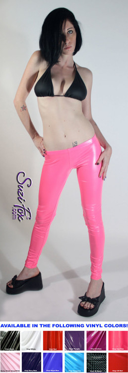 Womens Leggings shown in Neon Pink Gloss vinyl/PVC, custom made by Suzi Fox. 
Super Low rise shown. You can order this in almost any fabric on this site. 
• Custom made to your measurements!
• Available in black, red, white, light pink, neon pink, fuchsia, purple, royal blue, navy blue, turquoise, black matte (no shine), white matte (no shine) stretch vinyl coated spandex.
• 1 inch elastic at the waist.
• Optional 1 or 2-slider crotch zipper.
• Optional ankle zippers
• Optional rear patch pockets
• Optional belt loops
• Made in the U.S.A.