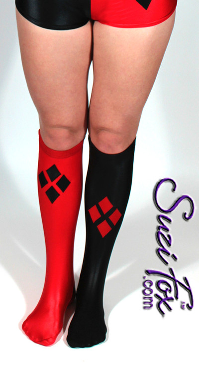 Harley Quinn Stockings shown in Black & Red Wetlook Lycra/Spandex custom made by Suzi Fox.
Diamonds on each stocking.
1 inch elastic at the top.
Popular fabrics are: red & black vinyl/PVC, red & black metallic foil, red & black wet look lycra Spandex.
Made in the U.S.A.