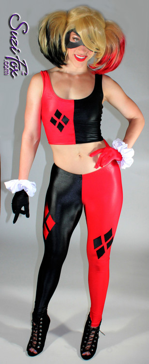 Harley Quinn Leggings shown in Black & Red Wet Look Lycra Spandex, custom made by Suzi Fox.
You can order this in almost any fabric on this site.
• Available in black, white, red, turquoise, navy blue, royal blue, hot pink, lime green, green, yellow, steel gray, neon orange Wet Look.
• Shown with optional tank top, and gloves.
• Custom made to your measurements!
• 4 diamonds on each leg
• 1 inch elastic at the waist.
• Optional 1 or 2-slider crotch zipper.
• Optional ankle zippers
• Optional rear patch pockets
• Optional belt loops
• Made in the U.S.A.
